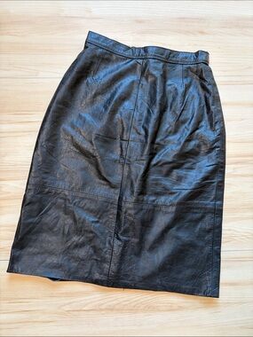 Sleek Black Genuine Leather Midi Skirt